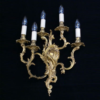 A single reproduction 5 branch wall light