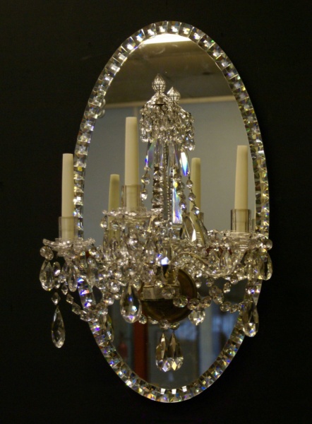 Georgian style wall light on oval mirror